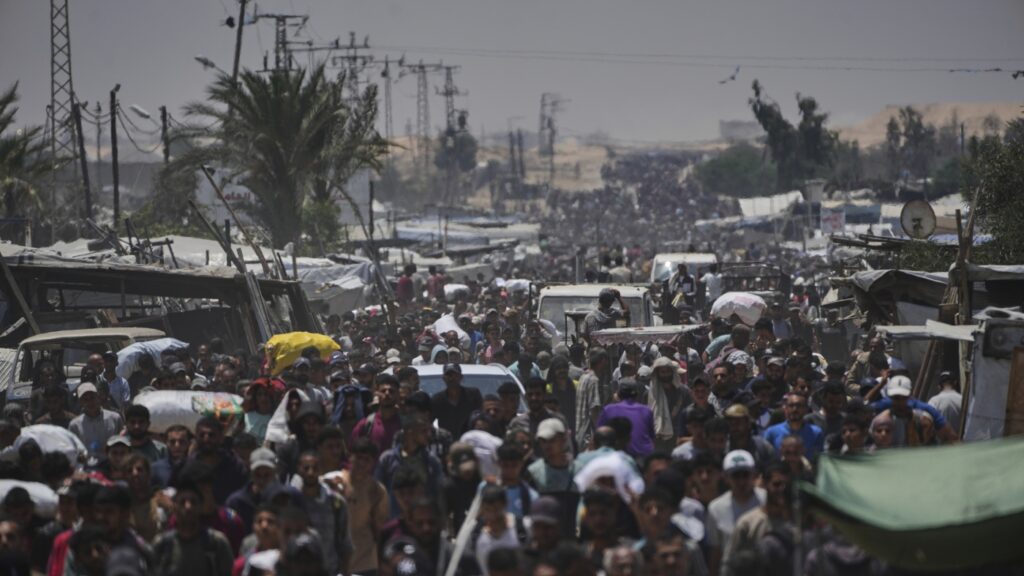 Palestinians say at least five people killed by Israeli gunfire near Gaza aid centers : NPR