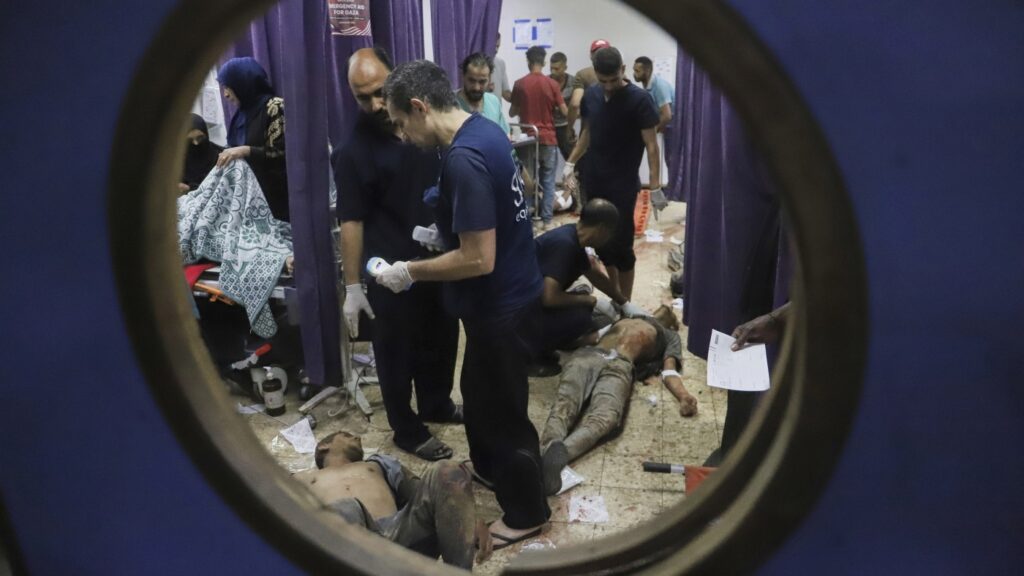 32 Palestinians killed trying to reach food distribution hubs, Gaza authorities say : NPR