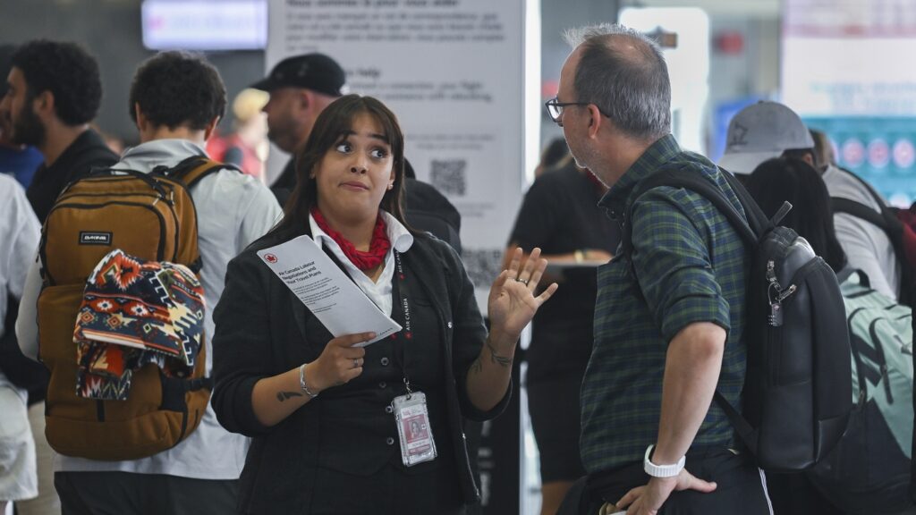 Air Canada suspends restart plans after union defies return to work order : NPR